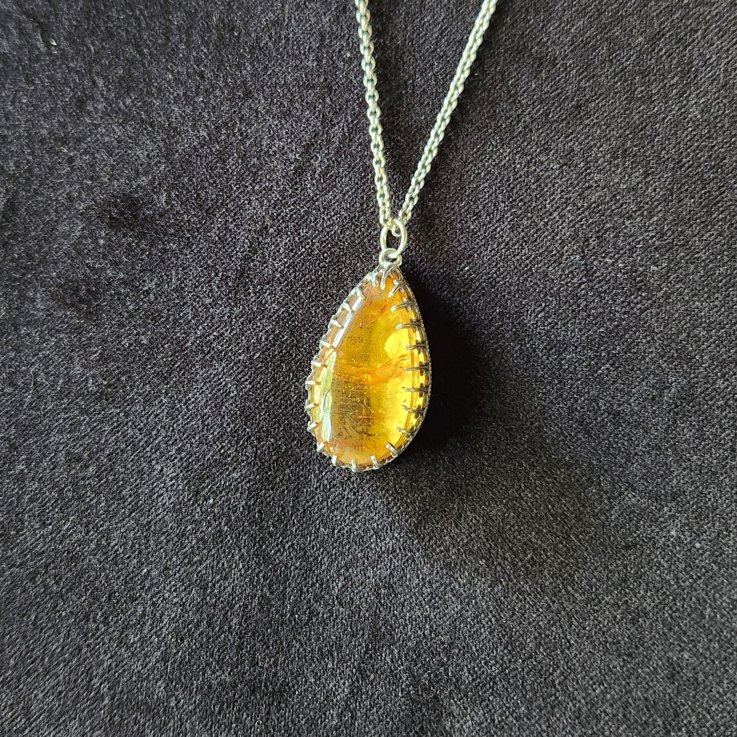 Large Amber Necklace in Sterling Silver with Clawed Bezel